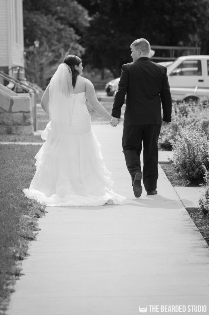 Bride And Groom Holding Hands